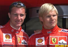 Eddie Irvine and Mika Salo, today