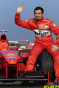 Max Biaggi on the Ferrari F300