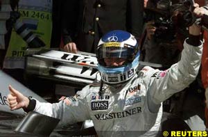 Hakkinen celevbrates his 24th pole