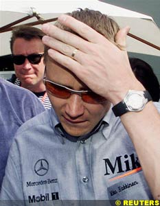 Hakkinen in the pits after he retired