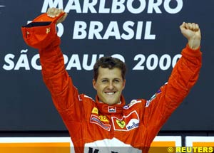 Michael Schumacher celebrates his win